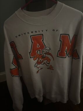 University of Miami White Crewneck Sweatshirt with Orange Graphic